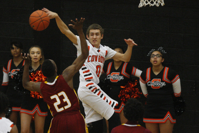 Chaparral guard Samuel Porras blocks a shot by Del Sol forward Noah Spearman on Thursday. Po ...