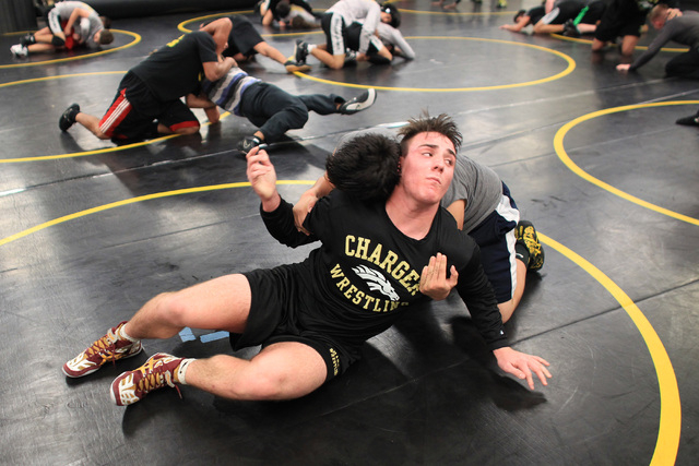 Clark wrestler Jacob Chaparian works out with Damian Garavito in practice on Tuesday. Chapar ...