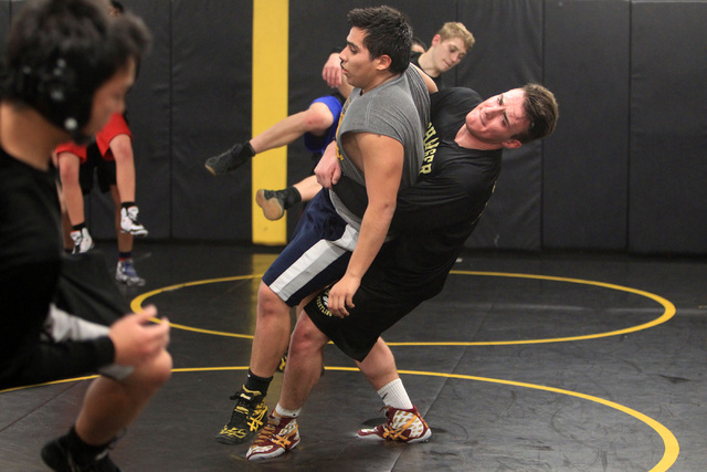 Clark wrestler Jacob Chaparian works out with Damian Garavito in practice on Tuesday. Chapar ...