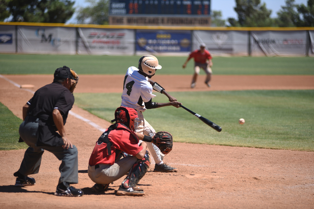 Summerlin Panthers Scotty Cosby swings at a pitch against the Las Vegas Cats during the cham ...