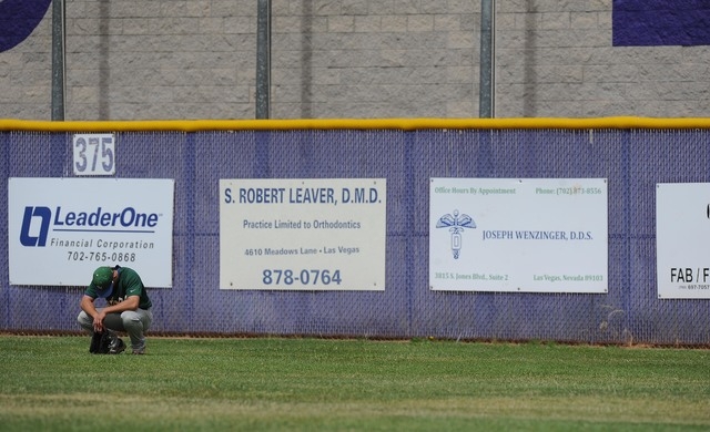 Green Valley right fielder Gavin Morley reacts after Bishop Gorman hit the game tying two-ru ...