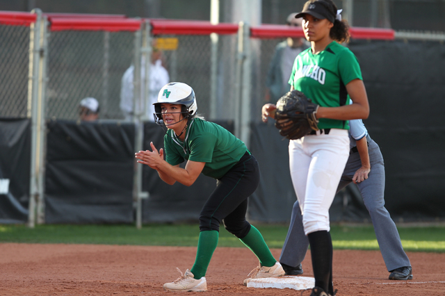 Palo Verde’s Jordan Menke (7) cheers her teammate from third base in the fifth inning ...