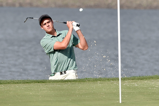 Palo Verde’s Jack Trent fires out of the bunker on the eighth hole during the first ro ...