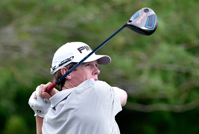 Arbor View’s Sam Dickey tees off during the first round of Division I state boys golf ...