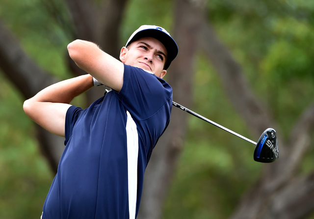 Shadow Ridge’s Tanner Johnson tees off on the first tee during the first round of Divi ...