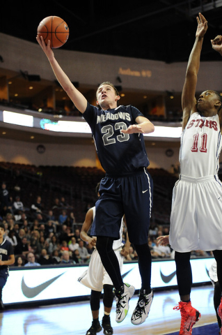 The Meadows School guard Jake Epstein (23) makes a layup against Agassi Prep guard Deishaun ...