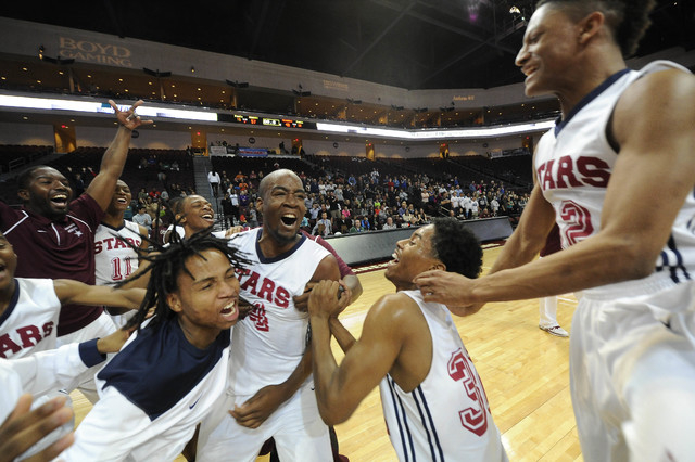 Agassi Prep players celebrate their win over The Meadows School in the Division III boys sta ...