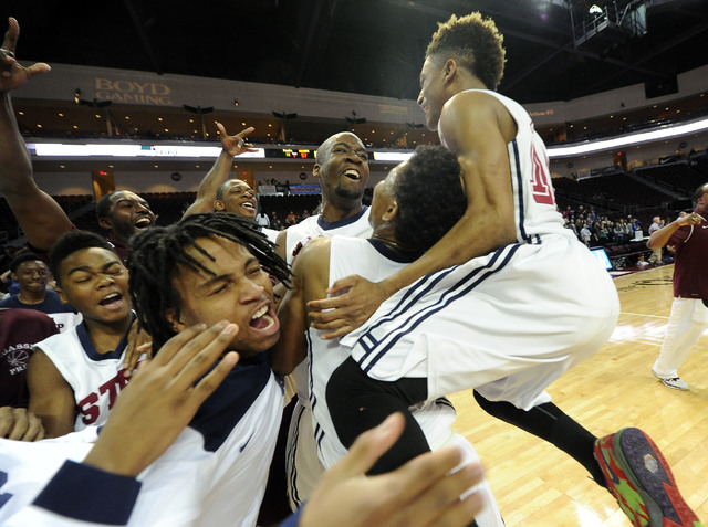 Agassi Prep players celebrate their win over The Meadows School in the Division III boys sta ...