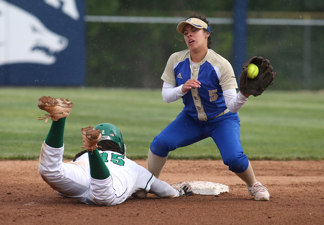 Rancho’s Yvette Sanchez dives back against Reed’s Alexis Gonzales during NIAA DI ...