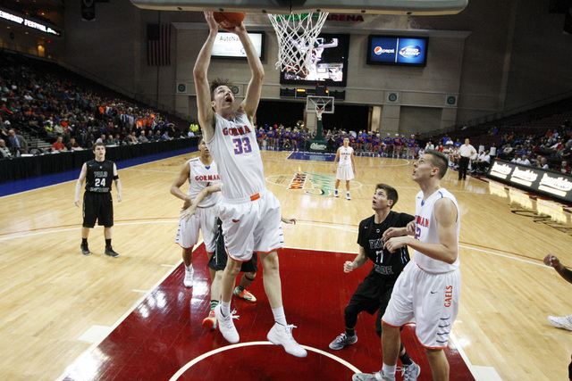 Bishop Gorman center Stephen Zimmerman gets a put back against Palo Verde during their Divis ...