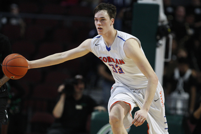 Bishop Gorman center Stephen Zimmerman takes the ball up court against Palo Verde during the ...