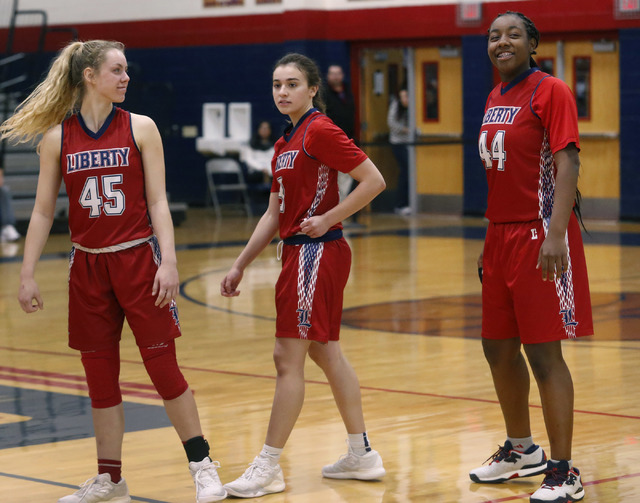 Liberty junior Dre’una Edwards (44) smiles during a basketball game on Tuesday, Jan. 2 ...