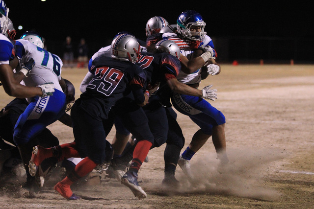 Green Valley running back Brenan Adams is stopped at the goal line to force a fourth down in ...