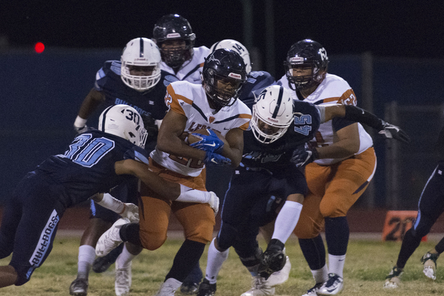 Legacy’s Samuel Turner (22) runs with the ball during a football game at Centennial in ...