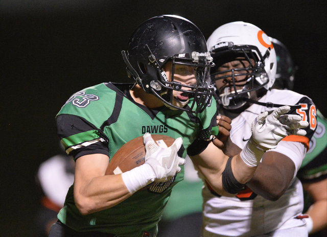 Virgin Valley running back Maurice Jayden Perkins (33) carries the ball during the Virgin Va ...