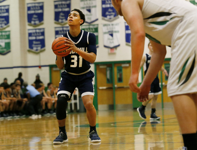 Foothill’s Marvin Coleman (31) shoots a free throw during a high school basketball gam ...