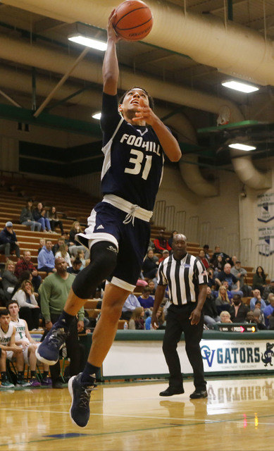 Foothill’s Marvin Coleman (31) shots a layup during a high school basketball game at G ...