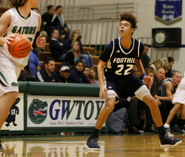 Foothill’s Jace Roquemore (22) guards a player during a high school basketball game at ...