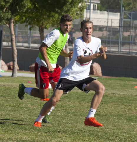 John Lynam, right, runs drills with his soccer teammate at Coronado High School on Tuesday, ...