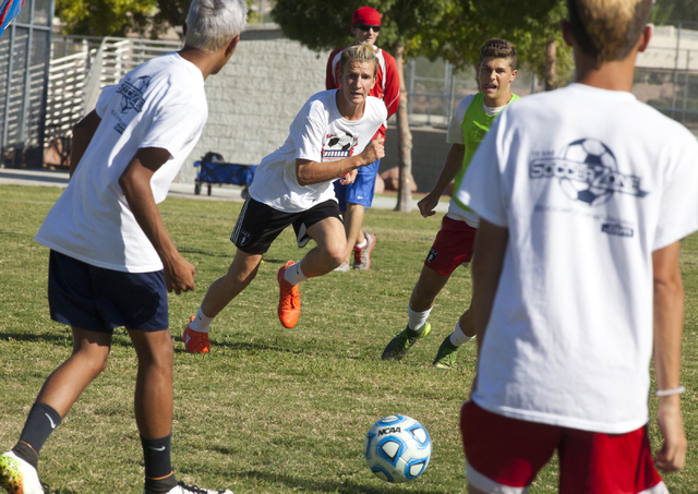 John Lynam, center, runs drills with his soccer teammates at Coronado High School on Tuesday ...