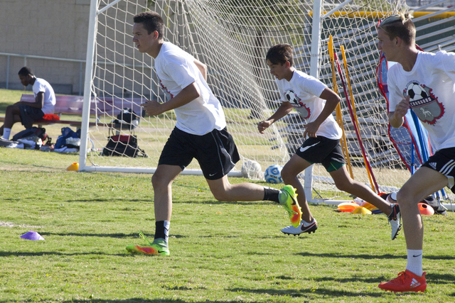 Preston Judd, left, runs drills with his soccer teammate at Coronado High School on Tuesday, ...