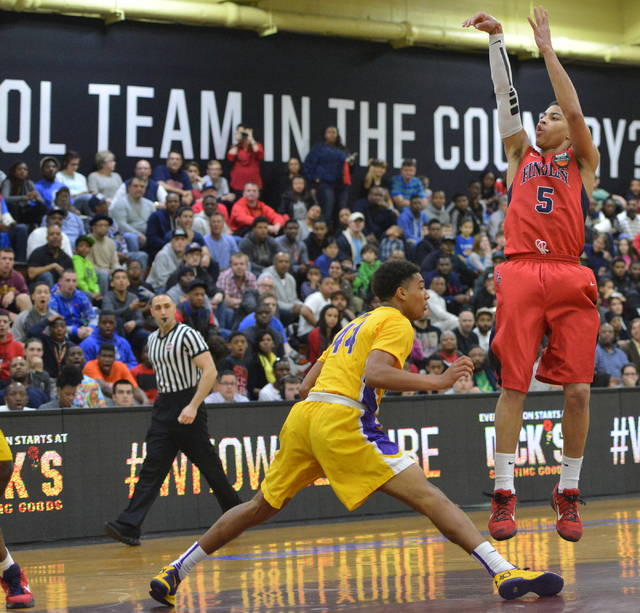 Findlay Prep Pilots junior Derryck Thornton Jr (5) shoots the ball over Montverde Academy Ea ...