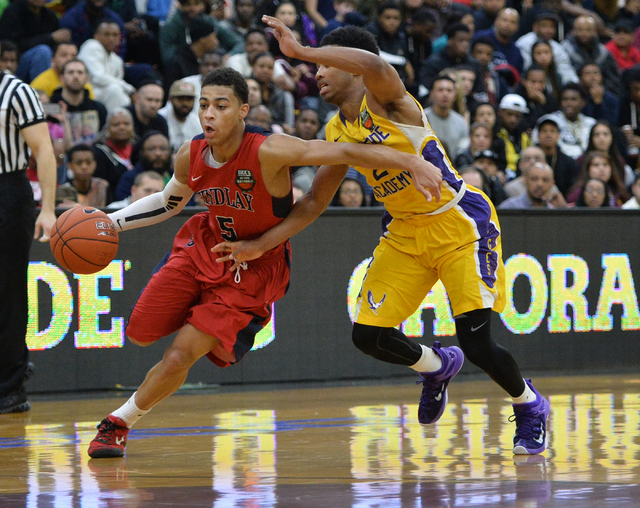 Findlay Prep Pilots junior Derryck Thornton Jr (5) dribbles the ball around Montverde Academ ...