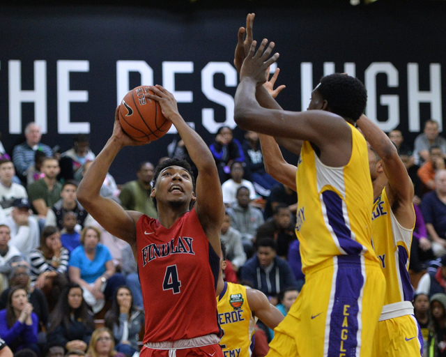 Findlay Prep Pilots senior Allonzo Trier (4) shoots the ball over Montverde Academy Eagles d ...