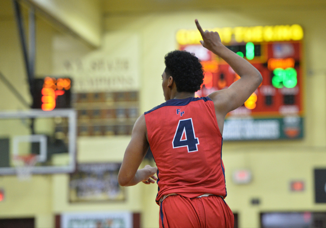 Findlay Prep Pilots senior Allonzo Trier (4) jogs back on defense after hitting a three poin ...