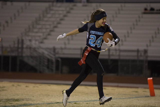 Centennial sophomore Denae Benites runs the ball against Cimarron-Memorial at Centennial Hig ...