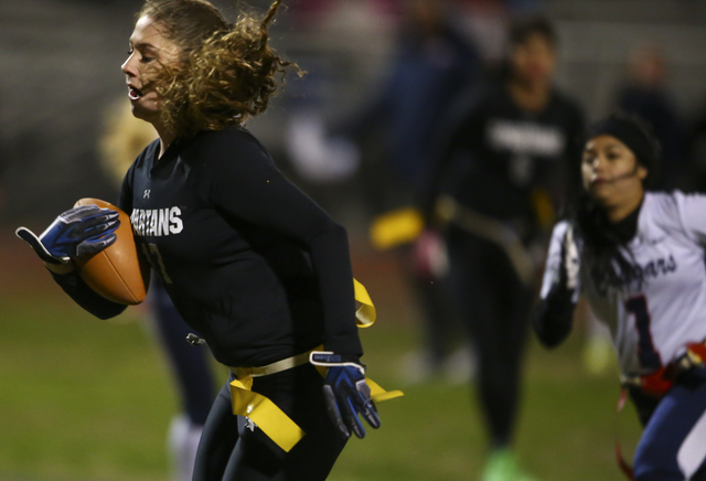 Cimarron-Memorial’s Alyssa Karpinski (17) runs towards the end zone to score a touchdo ...