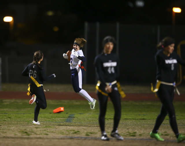 Coronado’s Shawna Slater (3) celebrates after scoring a touchdown on an interception d ...