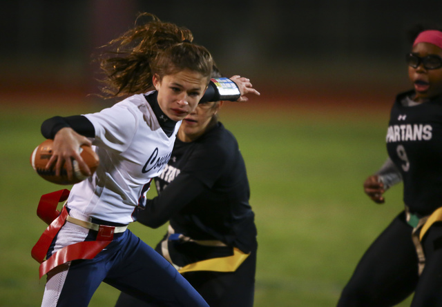 Coronado’s Caitlin Shannon (9) evades Cimarron-Memorial defenders while running the ba ...