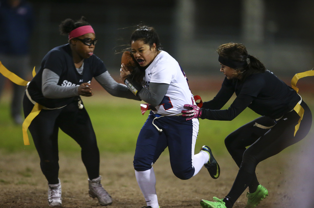 Coronado’s Drew Stewart (24) is tagged out by Cimarron-Memorial’s Dionna Whitley ...