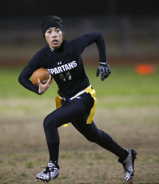 Cimarron-Memorial’s Tiarra Del Rosario (44) runs the ball against Coronado during the ...