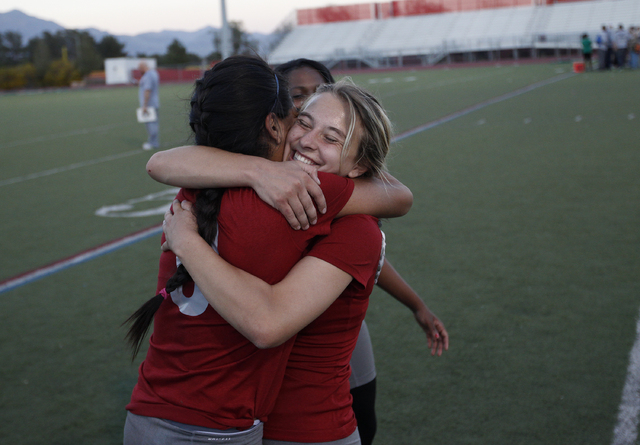 Cimarron-Memorial’s Jaymee Luke, right, hugs teammate Tiana Callejo after defeating Gr ...