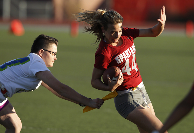 Cimarron-Memorial’s Jaymee Luke is tackled by Green Valley’s Allisa Hildreth dur ...