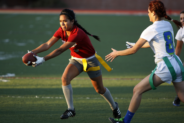 Cimarron-Memorial’s Tiana Callejo, left, gets past Green Valley’s Jackie Cook to ...