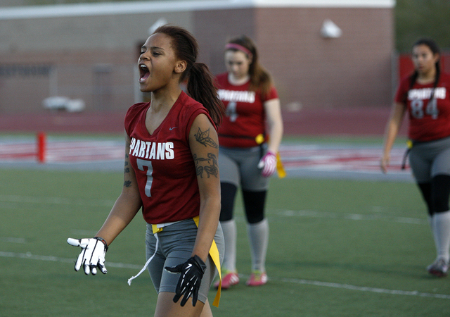 Cimarron-Memorial’s DeShan Cambrit, left, celebrates as her team leads Green Valley du ...