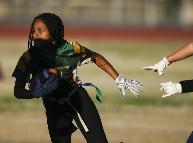 Rancho’s Talaya Williams (2) runs the ball against Coronado during a flag football gam ...