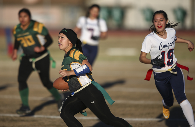 Rancho’s Katerina Anthony (27) runs the ball past Coronado’s Sofia Herrera (19) ...