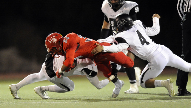 Palo Verde defensive back Graeson Vereen (1) and Palo Verde defensive back Darrion Finn (4) ...