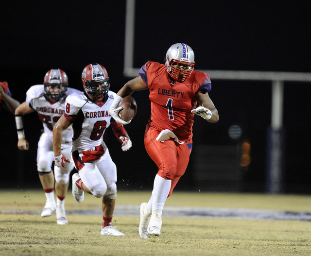 Liberty tight end Noah Jefferson picks up a first down against Coronado in the first quarter ...