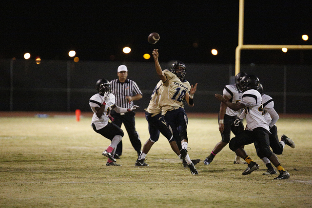 Cheyenne’s Noah Harker (11) throws a pass in the second half against Clark on Friday. ...