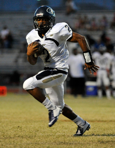 Cheyenne’s Zavieh Harrell runs with the ball against Cimarron-Memorial on Friday. (Dav ...