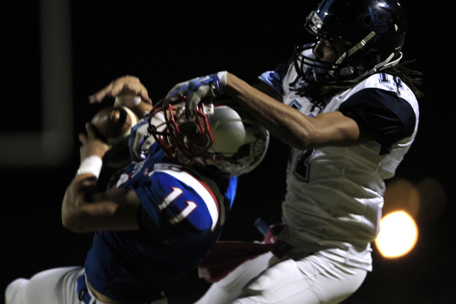 Liberty safety Preston Pavlica intercepts a pass against Canyon Springs on Oct. 2. Pavlica s ...