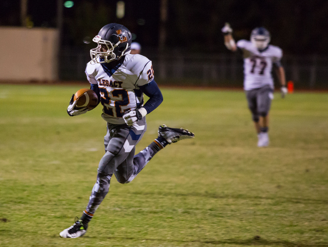 Legacy’s DeMichael Walker scores a touchdown during the second quarter at Cimarron-Mem ...