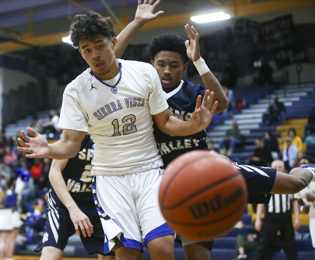 Sierra Vista forward Maui SeraJosef (12) loses control of the ball as Spring Valley guard Pa ...