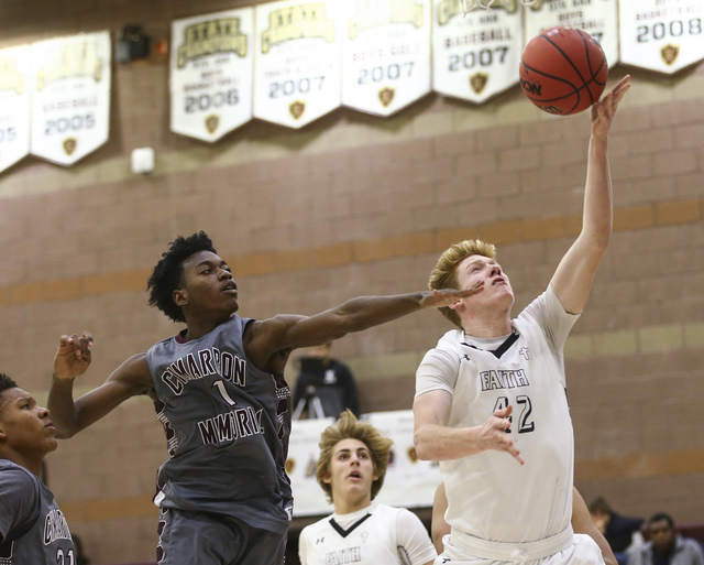 Faith Lutheran’s Elijah Kothe (42) goes up for a shot as Cimarron-Memorial guard Ja&#8 ...