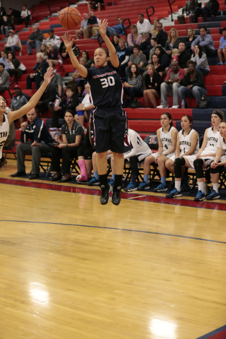 Coronado senior Dajah Washington (30) shoots a jumper during the first half on Thursday agai ...